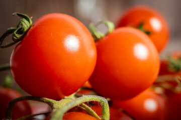 macro close up of red cherry tomato fresh garden vegetable 