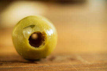 green pitted olive macro food close up 