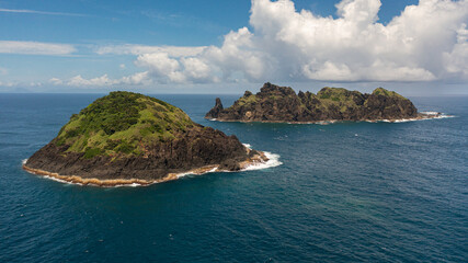 Tropical island and blue sea. Dos Hermanos Island. Santa Ana, Cagayan. Philippines.