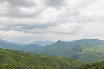 Fototapeta premium Beautiful Mountain valley with morning sunlight in songtal nature landscape image of manipur india.