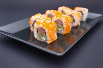 Sushi Display on Dark Slate Plate