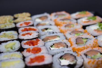 Sushi Feast on a Black Plate