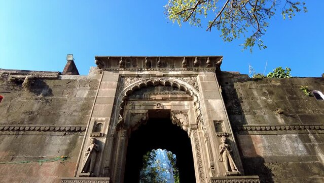 Maheshwar, Madhya Pradesh, INDIA - February 24, 2024, Exterior View of the scenic tourist landmark Maheshwar fort (Ahilya Fort) and temple. This monument is on the banks of the Narmada River.