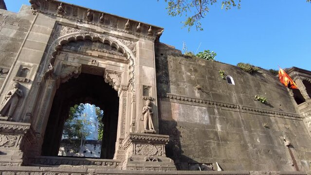 Maheshwar, Madhya Pradesh, INDIA - February 24, 2024, Exterior View of the scenic tourist landmark Maheshwar fort (Ahilya Fort) and temple. This monument is on the banks of the Narmada River.