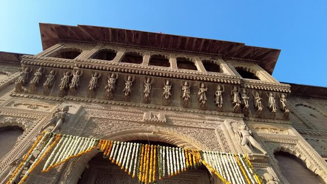 Maheshwar, Madhya Pradesh, INDIA - February 24, 2024, Exterior View of the scenic tourist landmark Maheshwar fort (Ahilya Fort) and temple. This monument is on the banks of the Narmada River.
