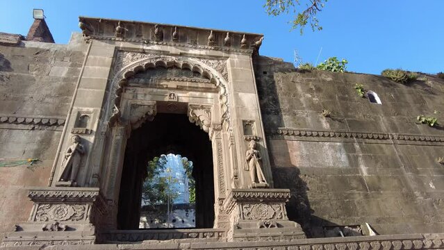 Maheshwar, Madhya Pradesh, INDIA - February 24, 2024, Exterior View of the scenic tourist landmark Maheshwar fort (Ahilya Fort) and temple. This monument is on the banks of the Narmada River.