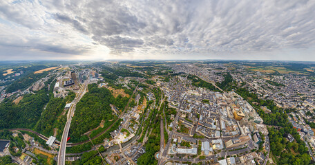 Luxembourg City, Luxembourg. Panorama of the city. Summer day, cloudy weather. Aerial view - obrazy, fototapety, plakaty