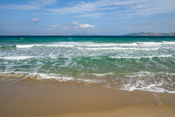 Fototapeta na wymiar Marmari beach with golden sand, emerald waters, the best beach of Kos. Dodecanese, Greece