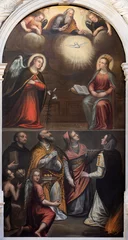  VICENZA, ITALY - NOVEMBER 5, 2023: The  painting of Anuntiation with the sanits in Chiesa di Santa Maria dei Servi by unknown artist. © Renáta Sedmáková