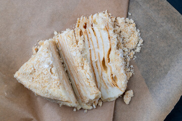 multi-layered cake made of buttercream and thin wheat cakes