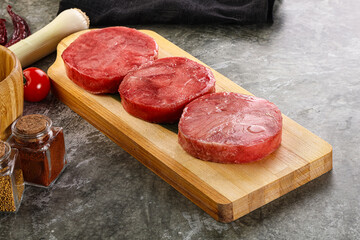 Delicous raw tuna medallion for cooking