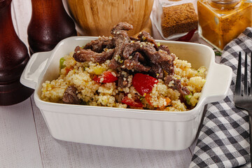 Traditional couscous with beef and vegetables