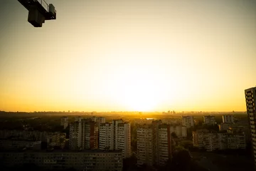 Deurstickers view of the city from above. Sunset in the city. Kyiv from above. View of Kyiv from above © Виталий Маслов