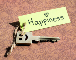 Happiness with hand and key