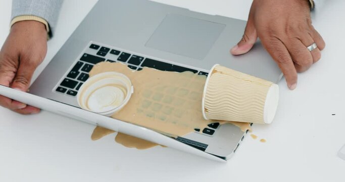Laptop, coffee and splash with mistake, problem and office accident from above. Keyboard spill, calculator and computer crisis with tech, stress and clumsy or frustrated office worker or accountant