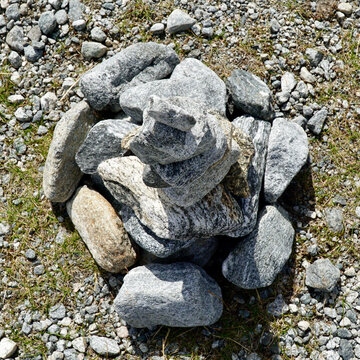 Rock cairn close-up symbolizing guidance and trail marking