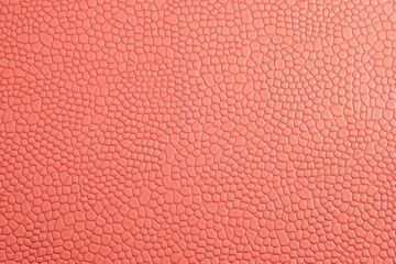 Coral leather pattern background with copy space for text or design showing the texture