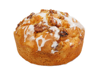 Round sweet dough cake with icing and walnut topping, side view studio shot isolated on white background