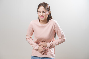 Flatulence asian young woman intolerance hand in stomach ache, suffer from food poisoning,...