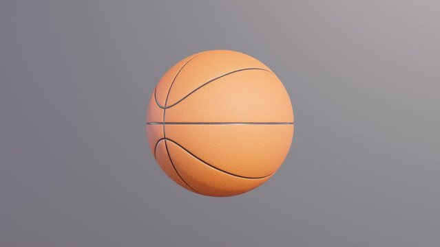 Basketball ball rotates on a black background. Simple 3d object animation. Realistic sport equipment render