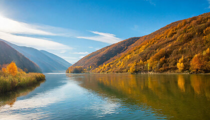 Beautiful landscape with autumn mountains and hills by the river