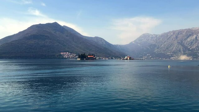 Islands off the coast of the town of Perast in the Bay of Kotor. Saint George island. Our Lady of the Rocks. Adriatic Sea. Perast, Montenegro. Europe.