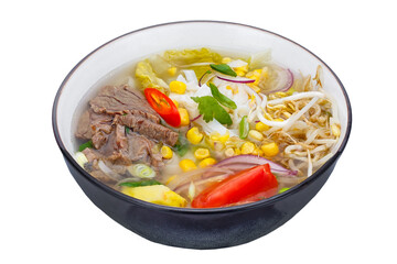 Thai style noodle soup with beef and vegetables isolated on white background