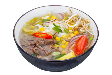 Thai style noodle soup with beef and vegetables isolated on white background