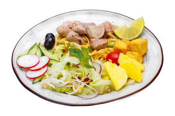 Noodles with tuna and vegetables on a white background. Isolated