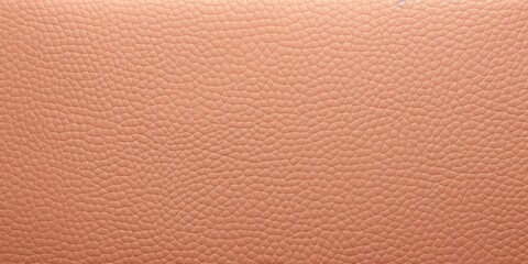 Peach leather pattern background with copy space for text or design showing the texture