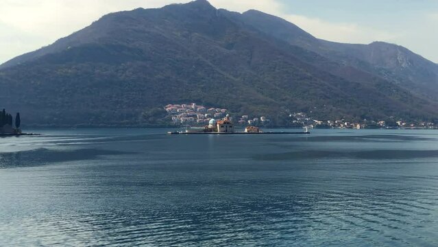 Islands in the Bay of Kotor. The Islands of Saint George and Our Lady of the Rocks near the town of Perast. Adriatic Sea. Perast, Montenegro. Europe.