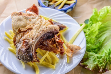 Savor the Flavor: Exquisite 4K Ultra HD View of Fresh Deep-Fried Yellowtail Collar with Soy Sauce and Ginger