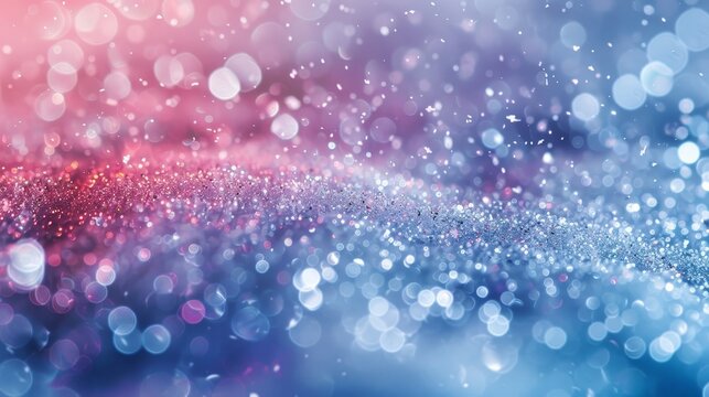 A blue and pink background with a lot of glitter. The glitter is scattered all over the background, creating a sparkling effect. The image has a dreamy and whimsical mood