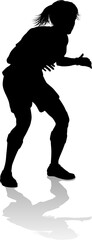 A female soccer football player woman in silhouettes