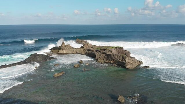Giant waves crashing on a rocky coastline in Uyugan Batanes Philippines