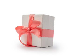 White present box with pink ribbon isolated on white - 778169381