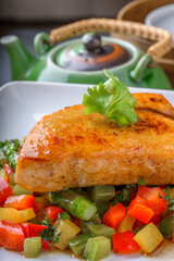 Gourmet Delight: Close-Up 4K Ultra HD Picture of Pan-Grilled Yellowtail Fish with Sautéed Vegetables