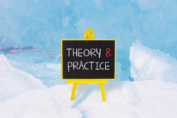 Theory and practice symbol. Concept words Theory and practice on beautiful yellow black blackboard....