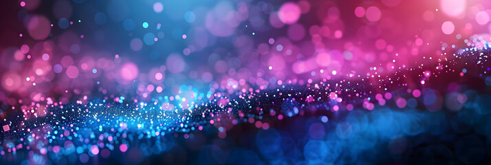 Time to celebrate with pink and blue glitter - wide sparkling bokeh  background ideal for a party invite
