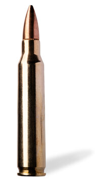 Shadow behind a 5.56 mm caliber cartridge designed for use in an assault rifle.