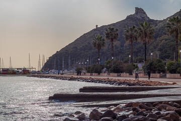 "Marina Piccola" promenade with the "Sella del Diavolo" in the background. Cagliari, Italy
