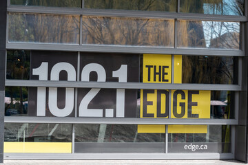 Fototapeta premium sign of 102.1 The Edge, a radio broadcaster, located at 25 Dockside Drive in Toronto, Canada