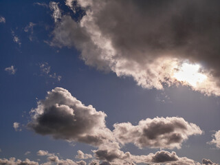 Cumulus clouds in the sky. Fluffy cloud shapes