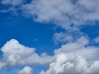 Cumulus clouds in the sky. Fluffy cloud shapes