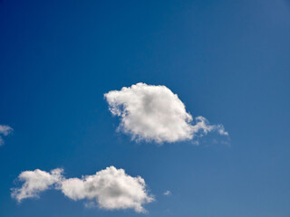 Cumulus clouds in the sky. Fluffy cloud shapes