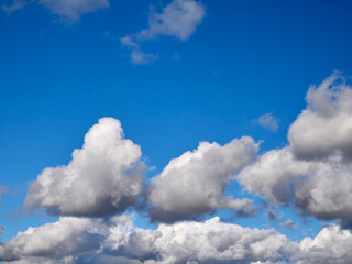 Cumulus clouds in the sky. Fluffy cloud shapes
