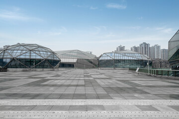 The appearance of modern buildings in empty squares and science museums