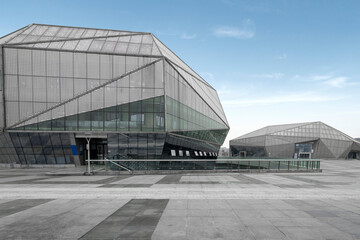 The appearance of modern buildings in empty squares and science museums