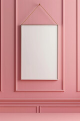 A white blank canvas hanging on a clean pink color wall