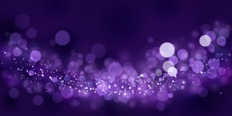 Abstract background in purple tones with many shiny sparkles, some of which are in focus and others are blurred, creating a captivating bokeh effect.